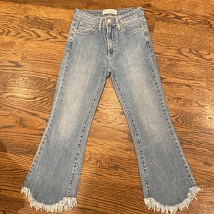 Medium Wash Jeans with Frayed Bottom